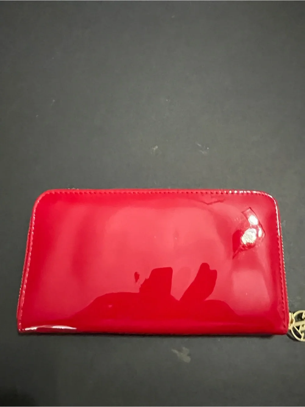 patent leather Adrienne Vittadini Studio Wallet featuring a zip-around